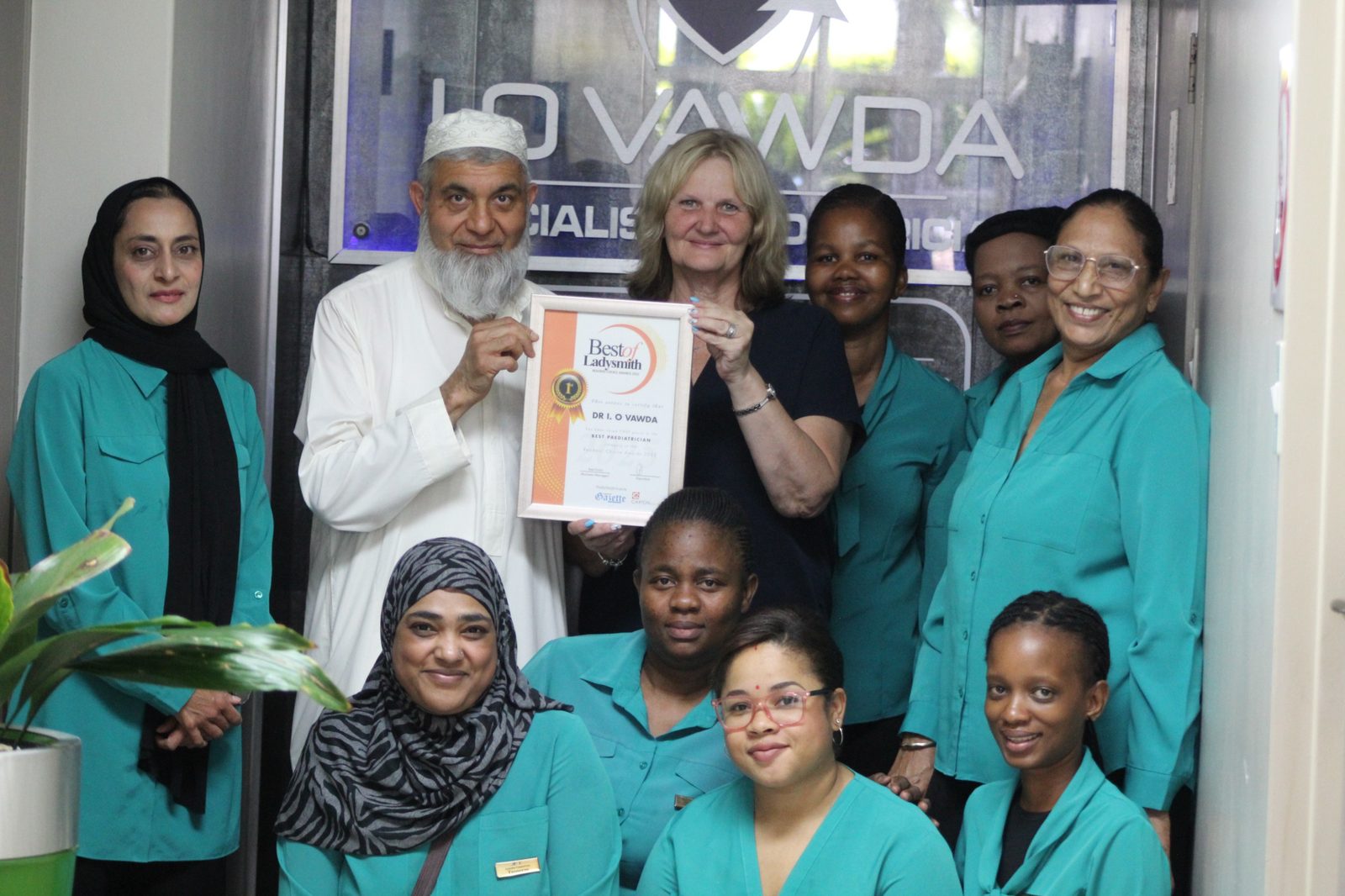 Dr I O Vawda and his practice team receiving the Best of Ladysmith Readers' Choice Award for Best Paediatrician