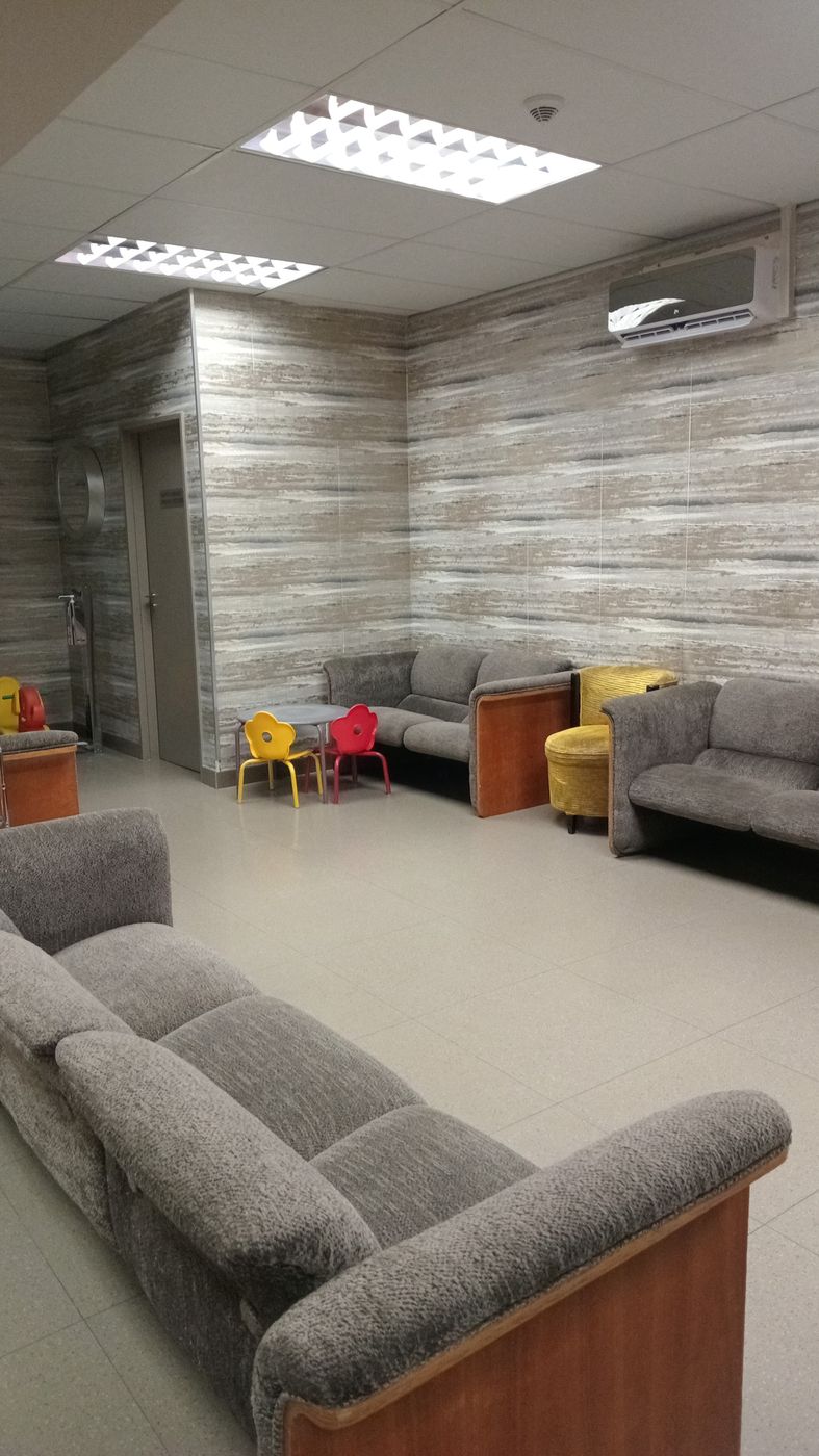 Child-friendly waiting room with play corner